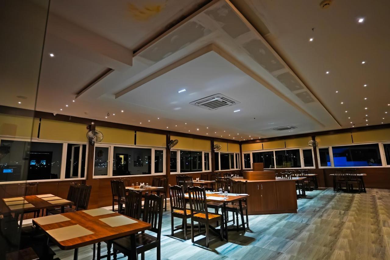 Hotel Sunrise Hospitality Vijayawada Bagian luar foto