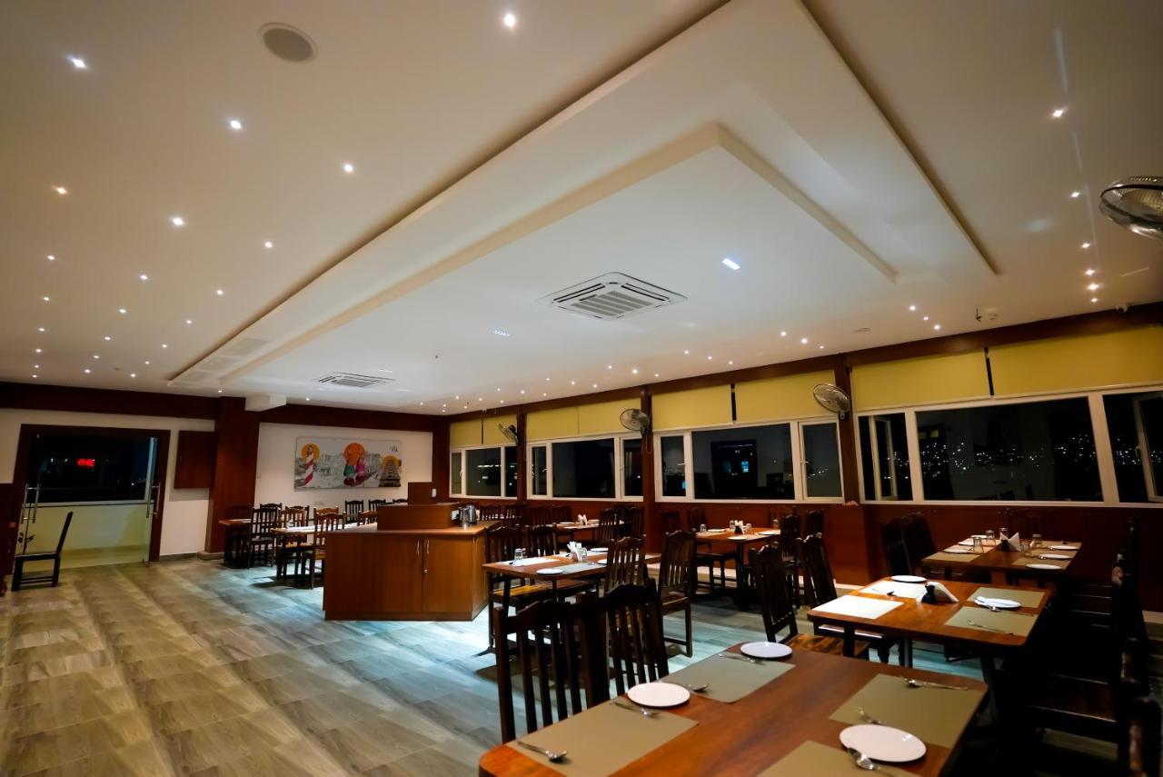 Hotel Sunrise Hospitality Vijayawada Bagian luar foto